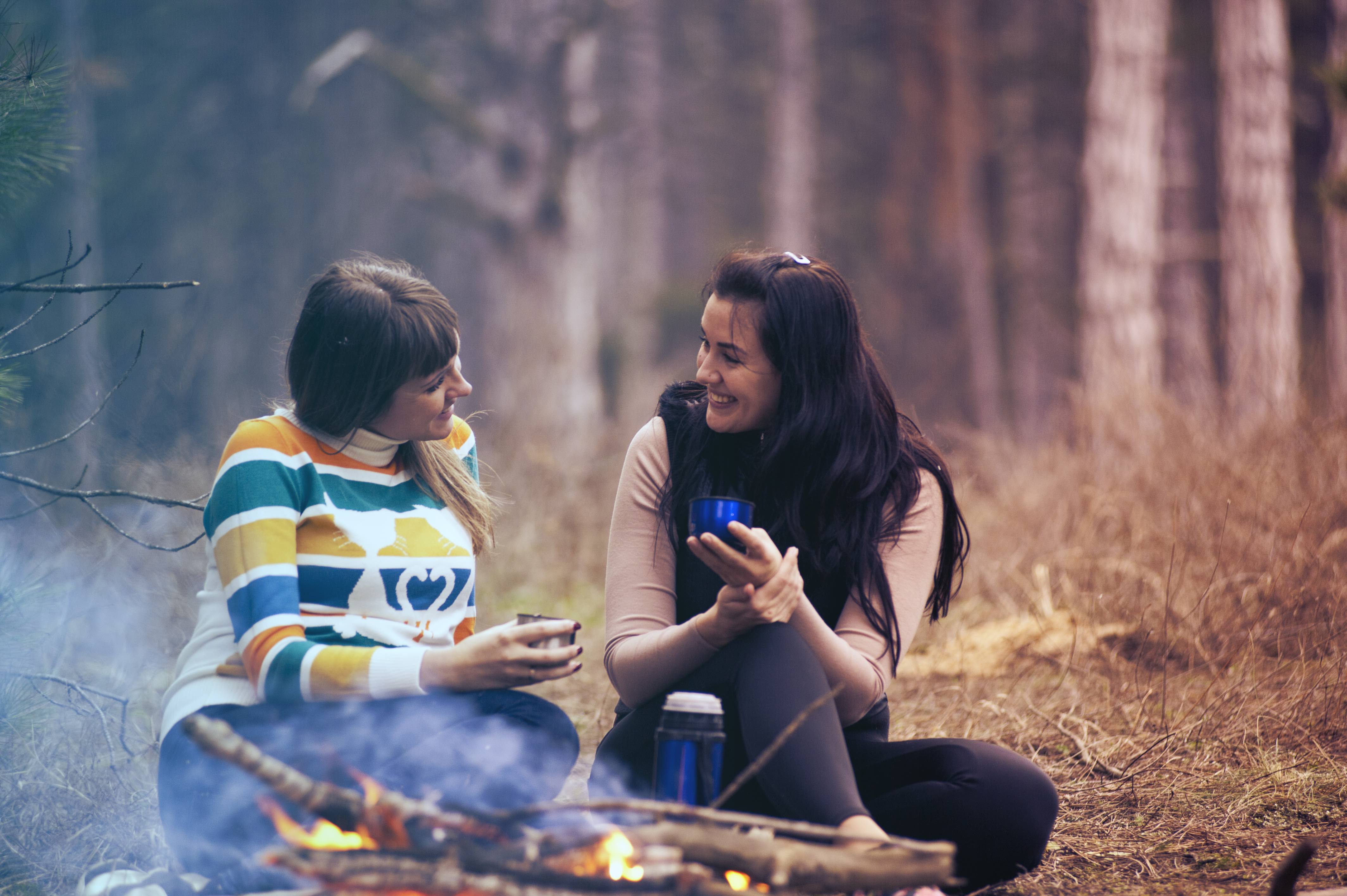 Two girls sitting and talking